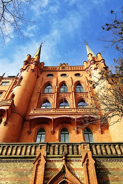 Red brick building with towers